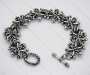 Stainless Steel Casting Mens' Bracelets with 8 little skull charms - KJB010003